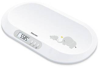 Eine weiße Babywaage mit digitaler Anzeige zeigt '5685'. Auf der Waage sind graue Elefanten abgebildet.