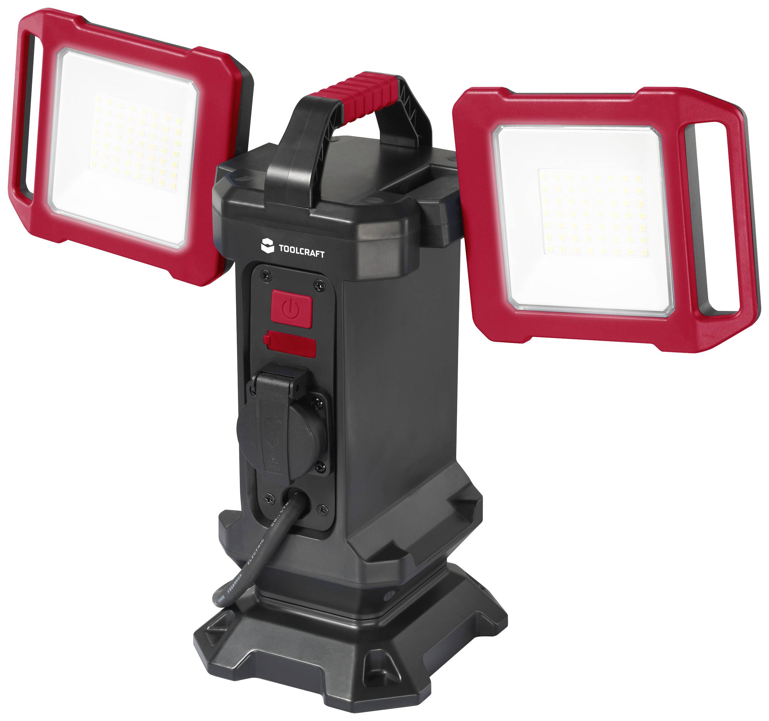 Zwei LED-Strahler mit roten Rahmen, die auf einem zentralen schwarzen Sockel montiert sind. Tragegriff und Kabelanschluss vorhanden.