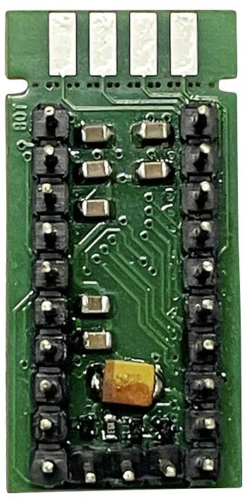Eine grüne elektronische Platine mit mehreren schwarzen und silbernen Bauteilen und sichtbaren Leiterbahnen.