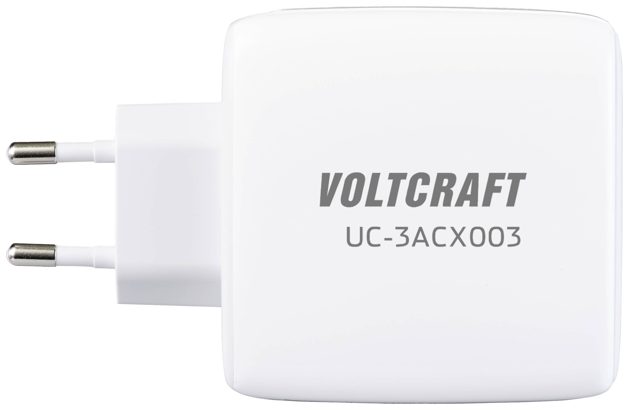 Weißes Netzteil mit Aufschrift 'VOLTCARFT UC-3ACX003', zwei runde Steckkontakte.