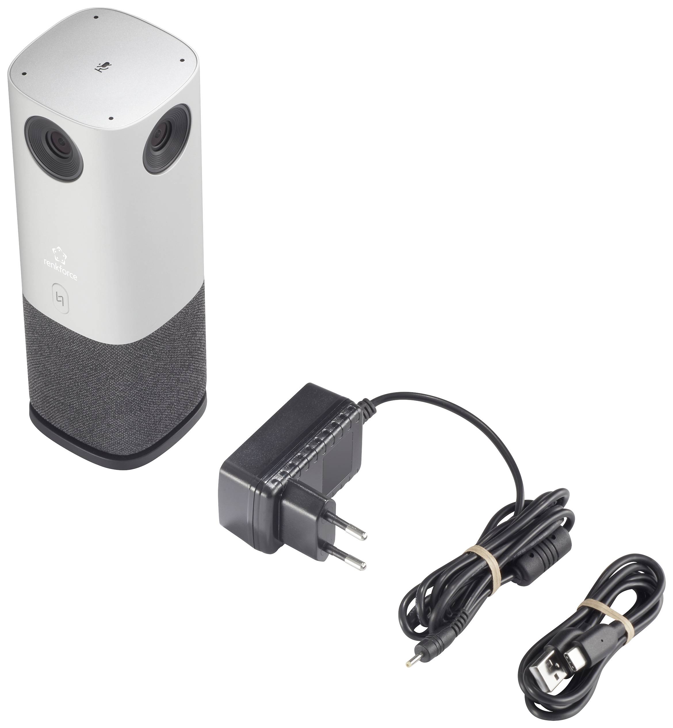 Ein grauer, zylindrischer Lautsprecher mit zwei Linsen neben einem schwarzen Netzteil und USB-Kabel.