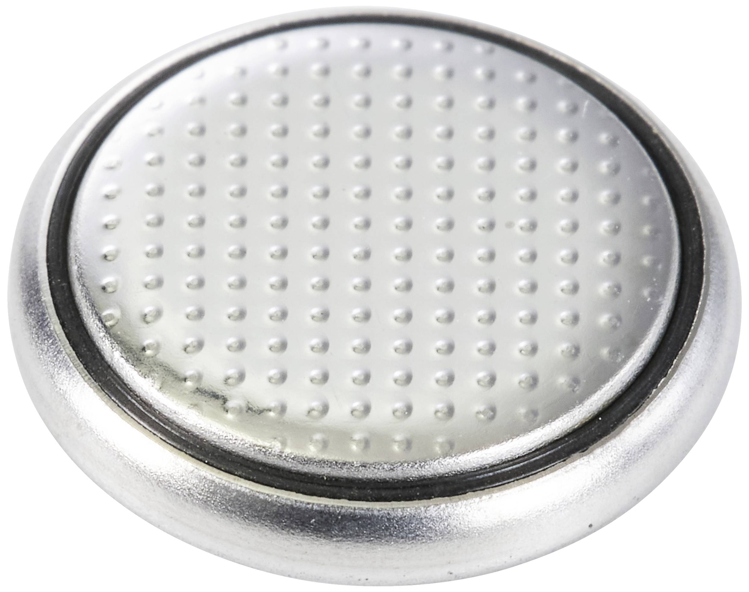 Silberne Knopfzellenbatterie mit punktierter Oberseite.