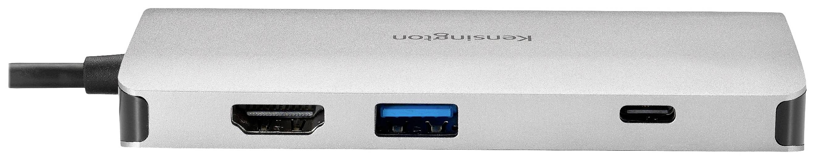 Ein silberner Adapter mit HDMI-, USB- und USB-C-Anschlüssen von der Marke Kensington. Geeignet für den Anschluss mehrerer Geräte.