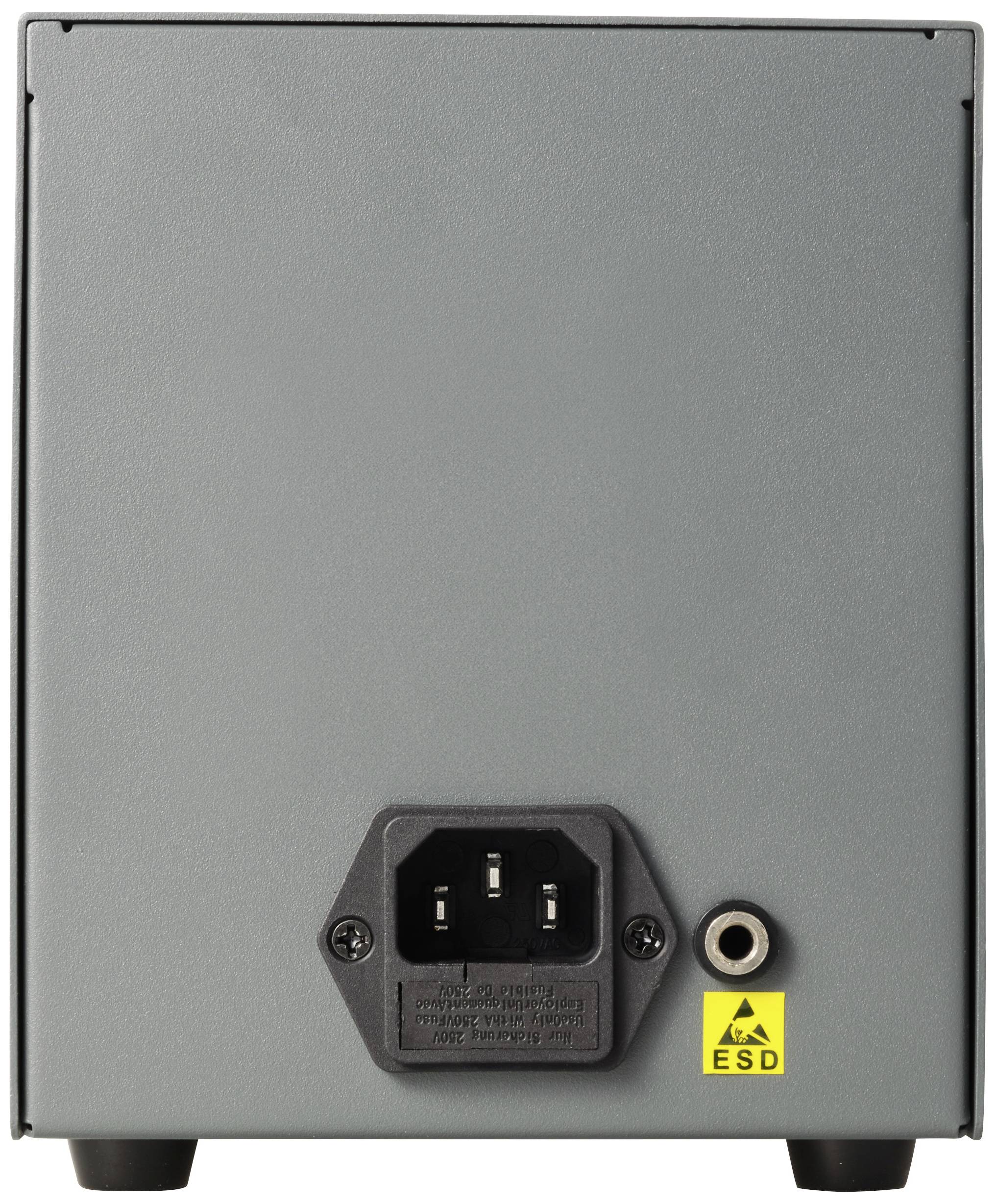 Rückseite eines elektronischen Geräts mit einem Netzkabelanschluss unten in der Mitte und einem gelben ESD-Warnhinweis rechts daneben.