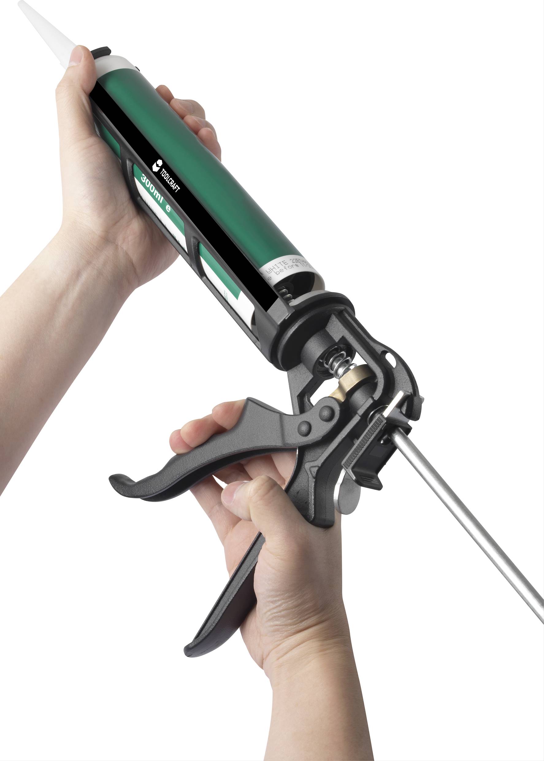 Eine Handpistole wird gehalten und betätigt. Diese wird üblicherweise zum Auftragen von Dichtstoffen oder Klebstoffen verwendet.