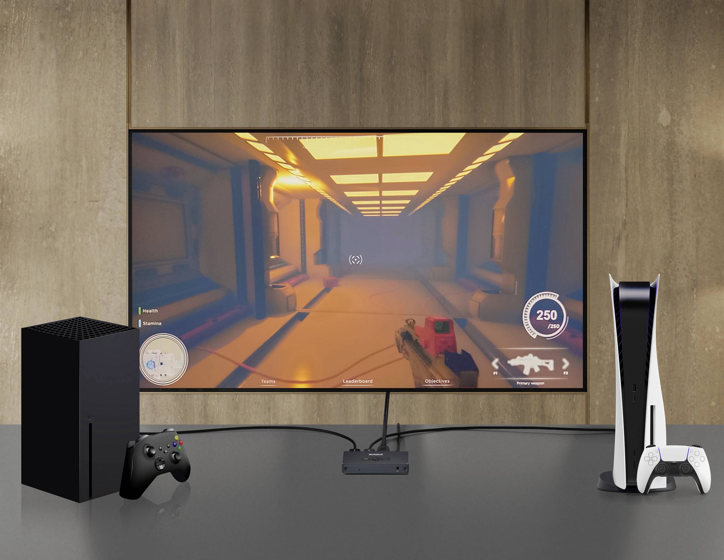 Ein Fernseher zeigt ein Videospiel in einem futuristischen Gang. Daneben stehen eine Konsole mit Controller und eine andere Konsole.