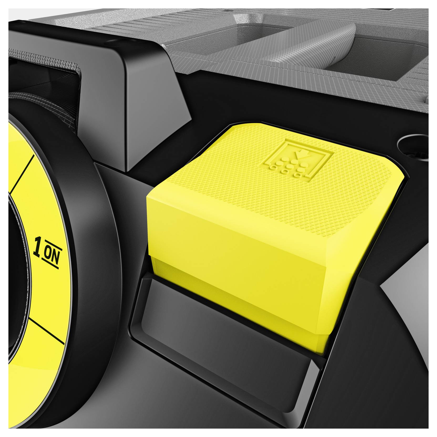 Nahaufnahme eines gelben Knopfes mit strukturierter Oberfläche auf einem schwarz-grauen Gerät, mit einem blassen Symbol, das auf Funktionalität hindeutet.