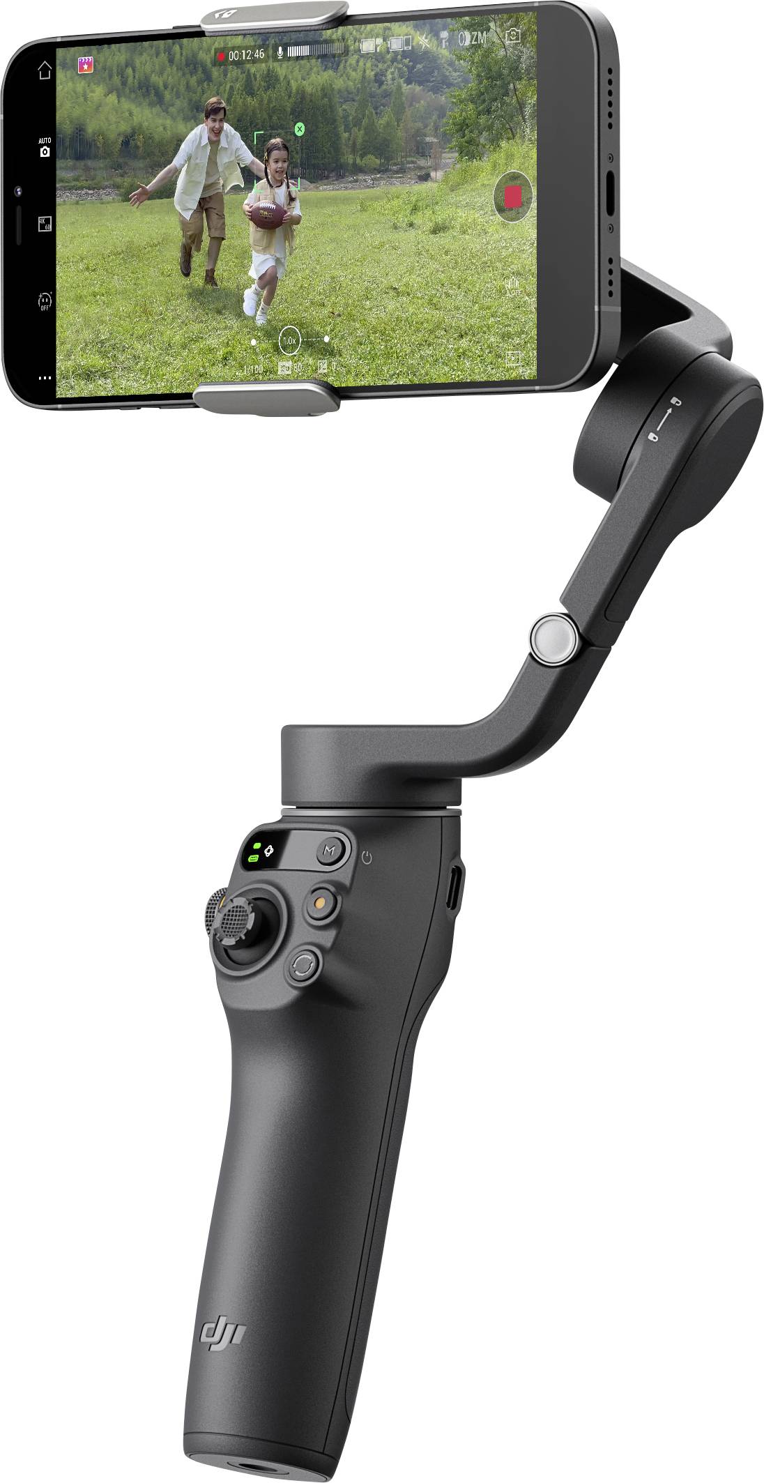 Ein Smartphone-Gimbal mit integriertem Smartphone, das ein Video von zwei Menschen auf einer grünen Wiese aufnimmt.