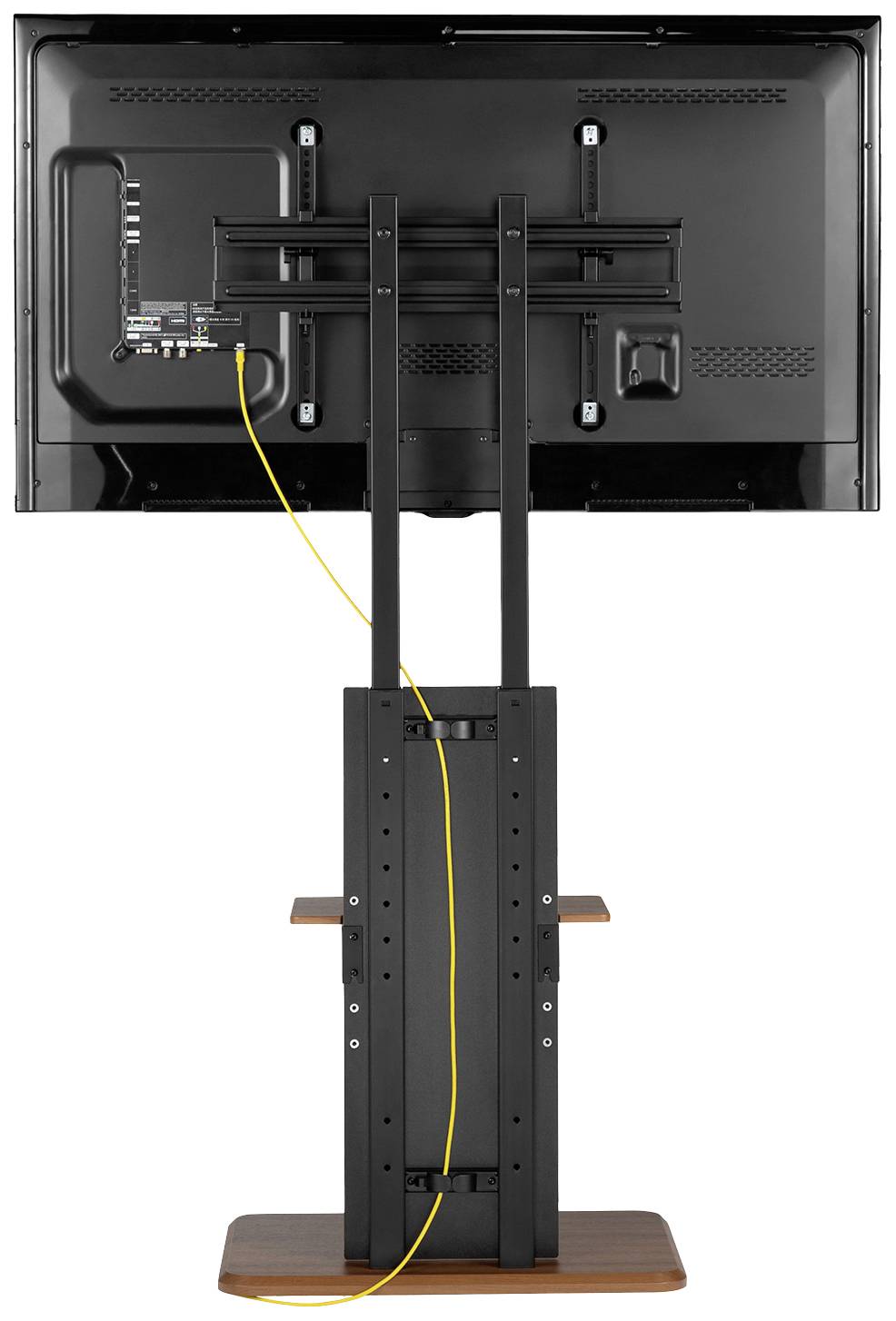 Ein Fernseher von hinten, montiert auf einem schwarzen Standfuß. Ein gelbes Kabel ist an einen der Anschlüsse auf der Rückseite angeschlossen.