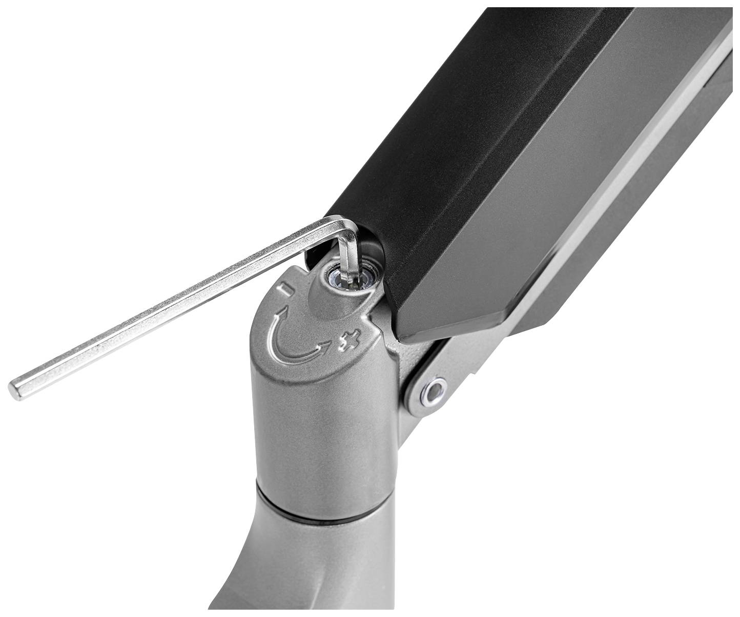 Ein Inbusschlüssel justiert eine Metallschraube an einem Scharnier. Das Bild zeigt den Mechanismus zur Feinabstimmung eines Gelenks.