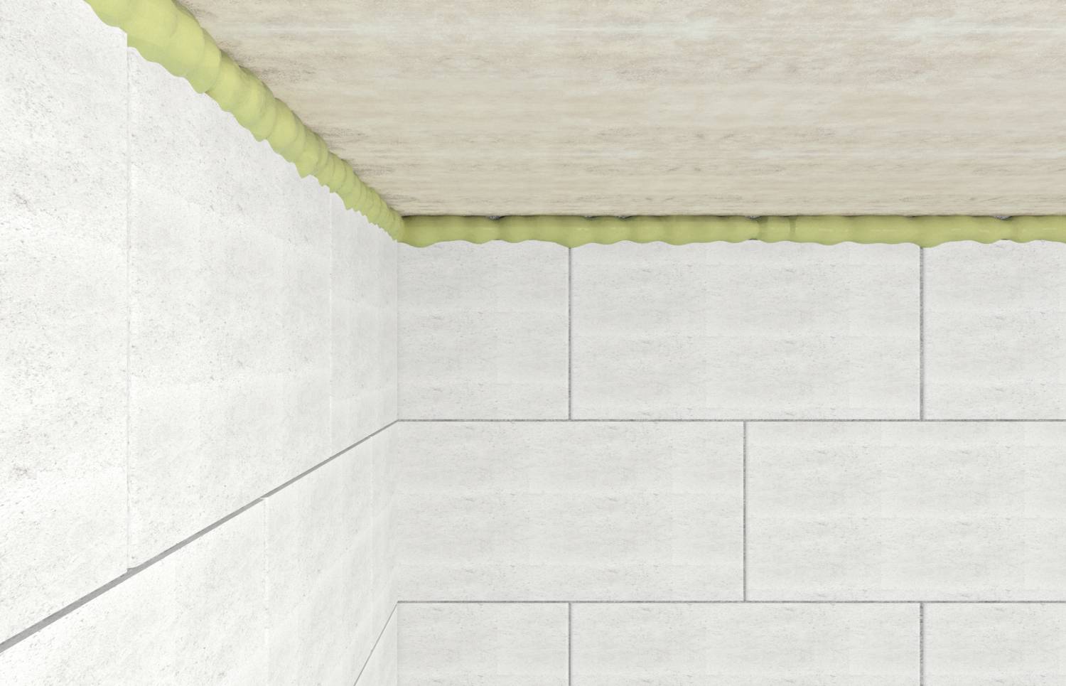 Ecke eines Raums mit weißer Fliesenwand und Decke. Oben an der Wand ist eine Linie aus gelblichem Montageschaum sichtbar.