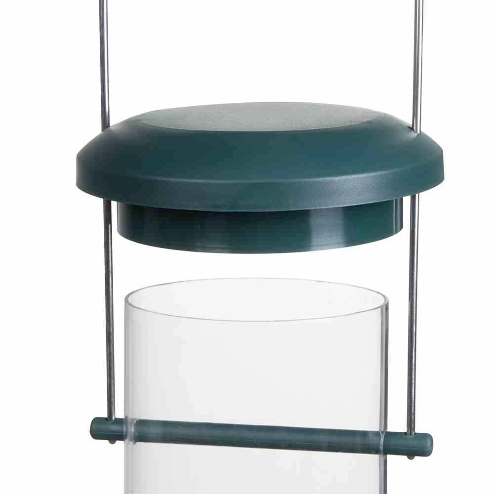 Transparentes Vogelhaus aus Glas mit grünem Dach, Metallstange in der Mitte, zum Befüllen mit Vogelfutter.