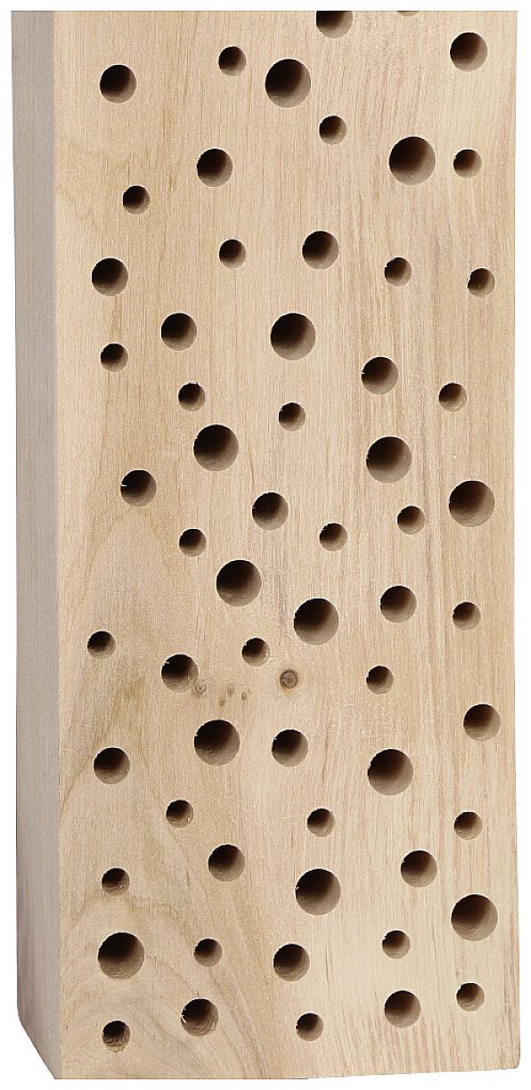 Block aus Holz mit unterschiedlichen Bohrlöchern, möglicherweise für die Lagerung von Stiften oder ähnlichen Gegenständen.