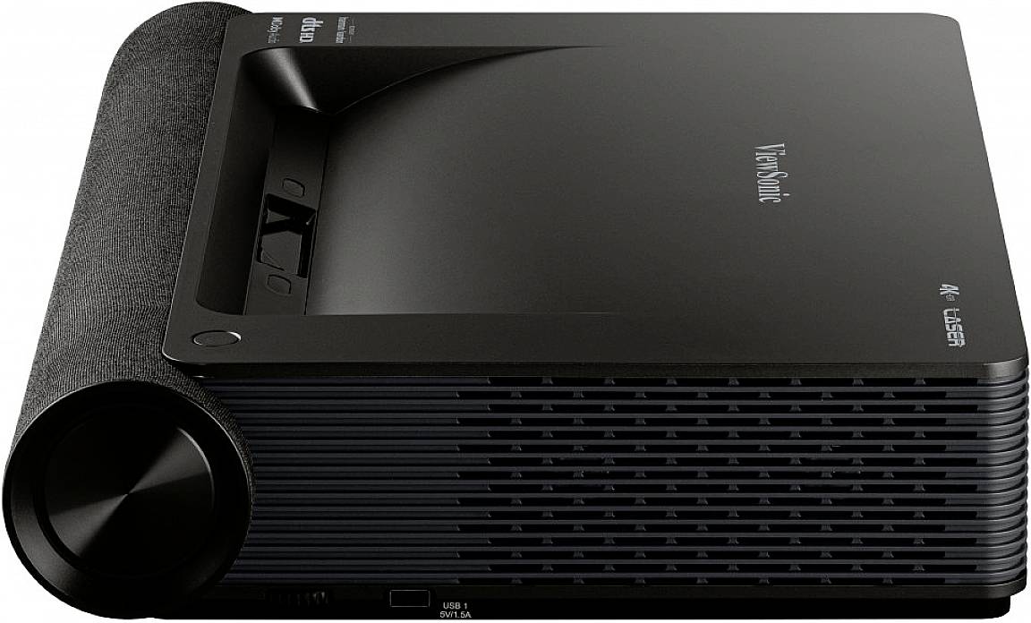 Ein schwarzer Projektor mit der Aufschrift 'ViewSonic' und '4K Laser'. Das Gerät hat ein modernes Design mit Lüftungsgittern an der Seite.