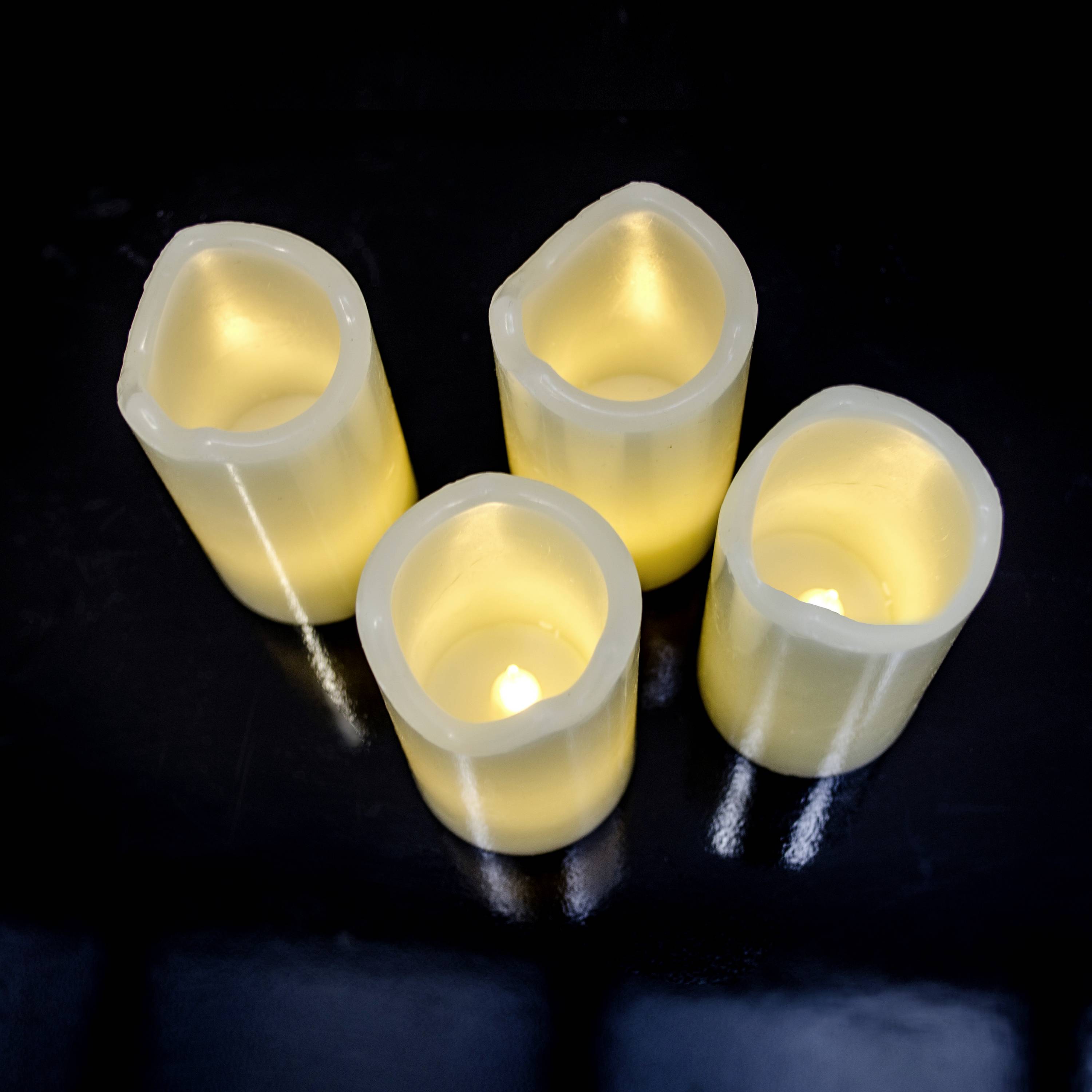 X4-LIFE 701973 LED-Echtwachskerze 4er Set mit Fernbedienung