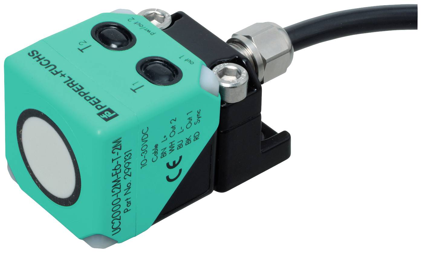 Ein eckiger, grüner Sensor von Pepperl+Fuchs mit zwei Tasten, Kabelanschluss und einer weißen Sensorkappe.