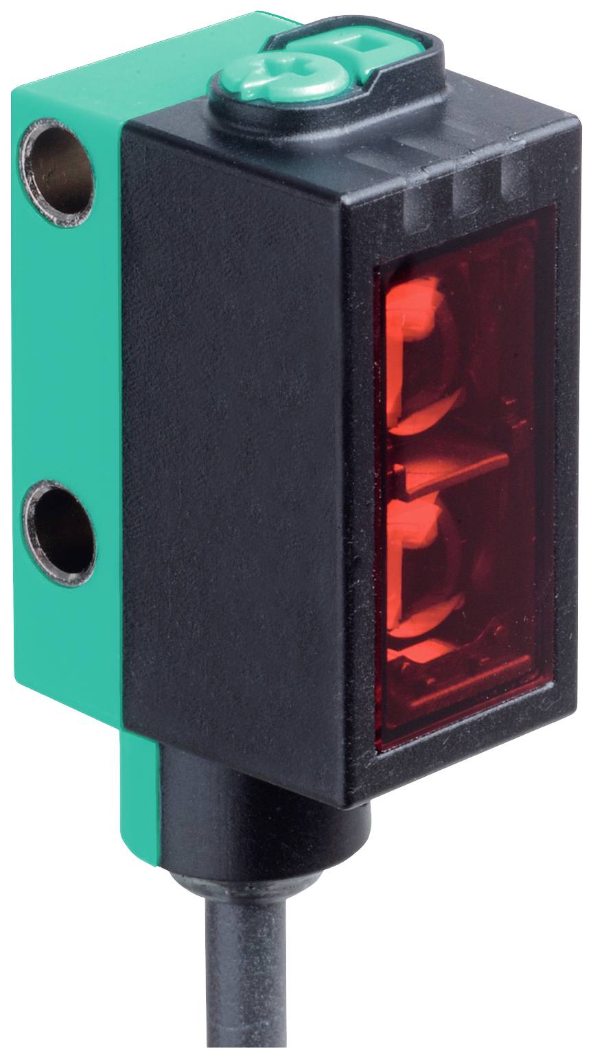 Ein rechteckiger Sensor mit schwarzer und grüner Hülle. Er hat eine rote Linse und einen Anschluss an der Unterseite.