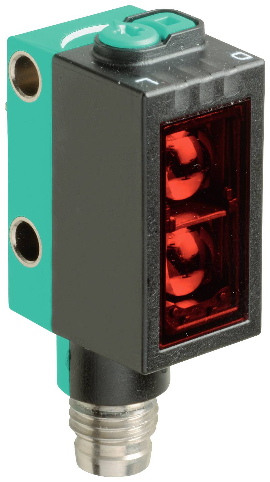 Ein rechteckiger Sensor mit roter Frontlinse, grünem Gehäuse und metallischem Anschluss. Er dient zur Objekterkennung in industriellen Anwendungen.