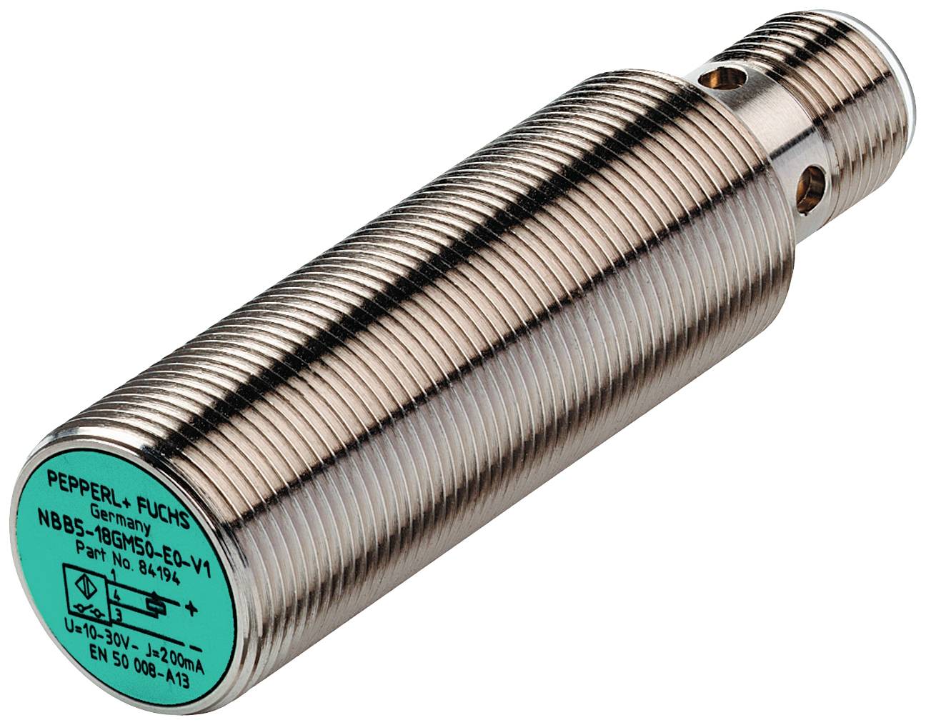 Ein zylindrischer, metallischer Sensor mit Gewinde, Herstellerdetails und technischen Spezifikationen auf einem grünen Etikett.