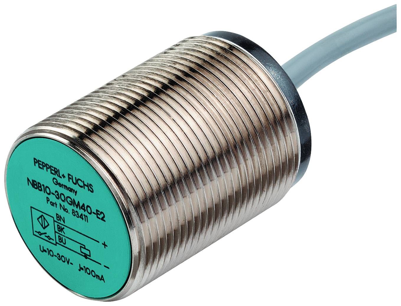 Ein zylindrischer Sensor von Pepperl+Fuchs mit Kabelanschluss. Der Sensor hat eine grüne Endkappe mit technischen Spezifikationen.