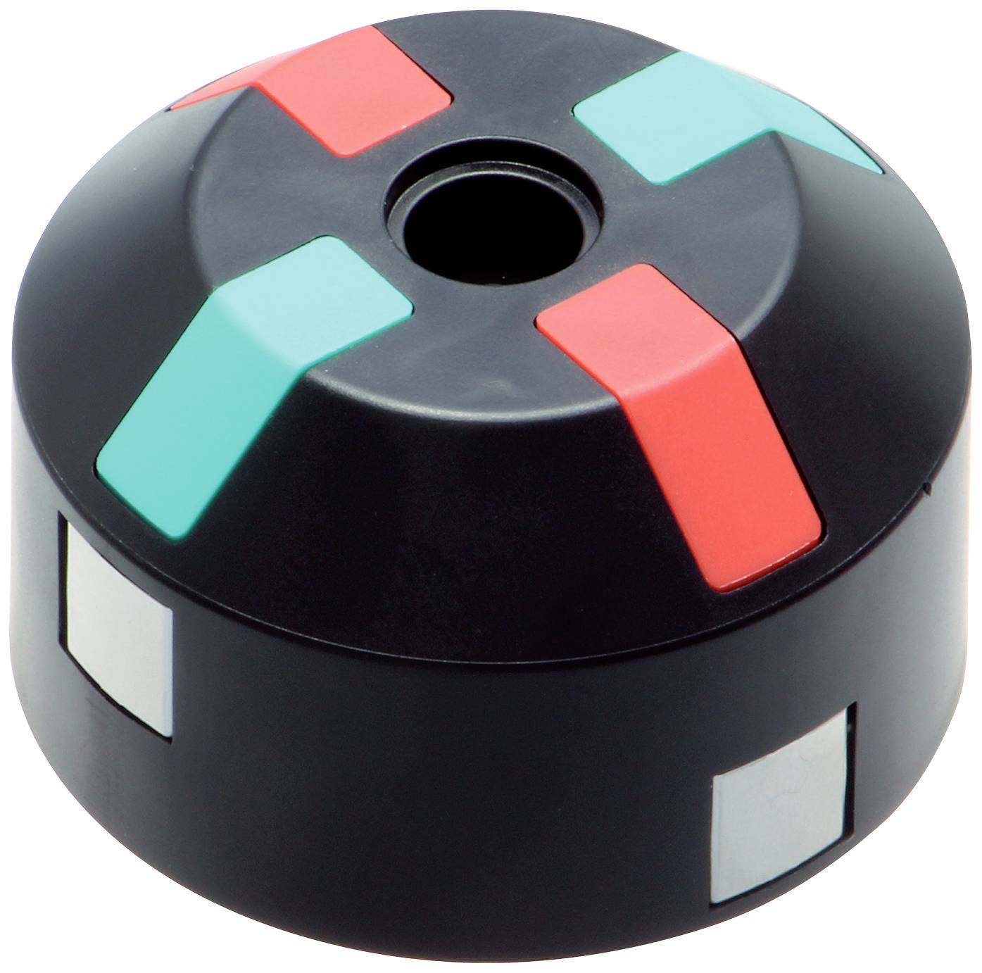 Ein schwarzes, rundes Kunststoffteil mit bunten Markierungen in Rot und Grün auf der Oberseite. Möglicherweise ein mechanisches Bauteil.