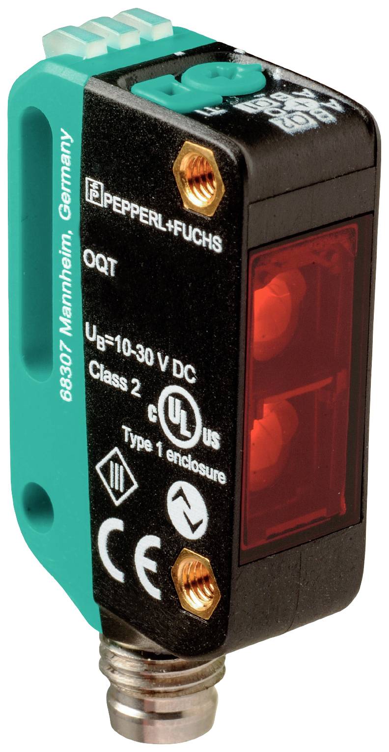 Optischer Sensor in industrieller Anwendung mit schwarzem Gehäuse und seitlichen Schraubanschlüssen. Beschriftet 'Pepperl+Fuchs'.