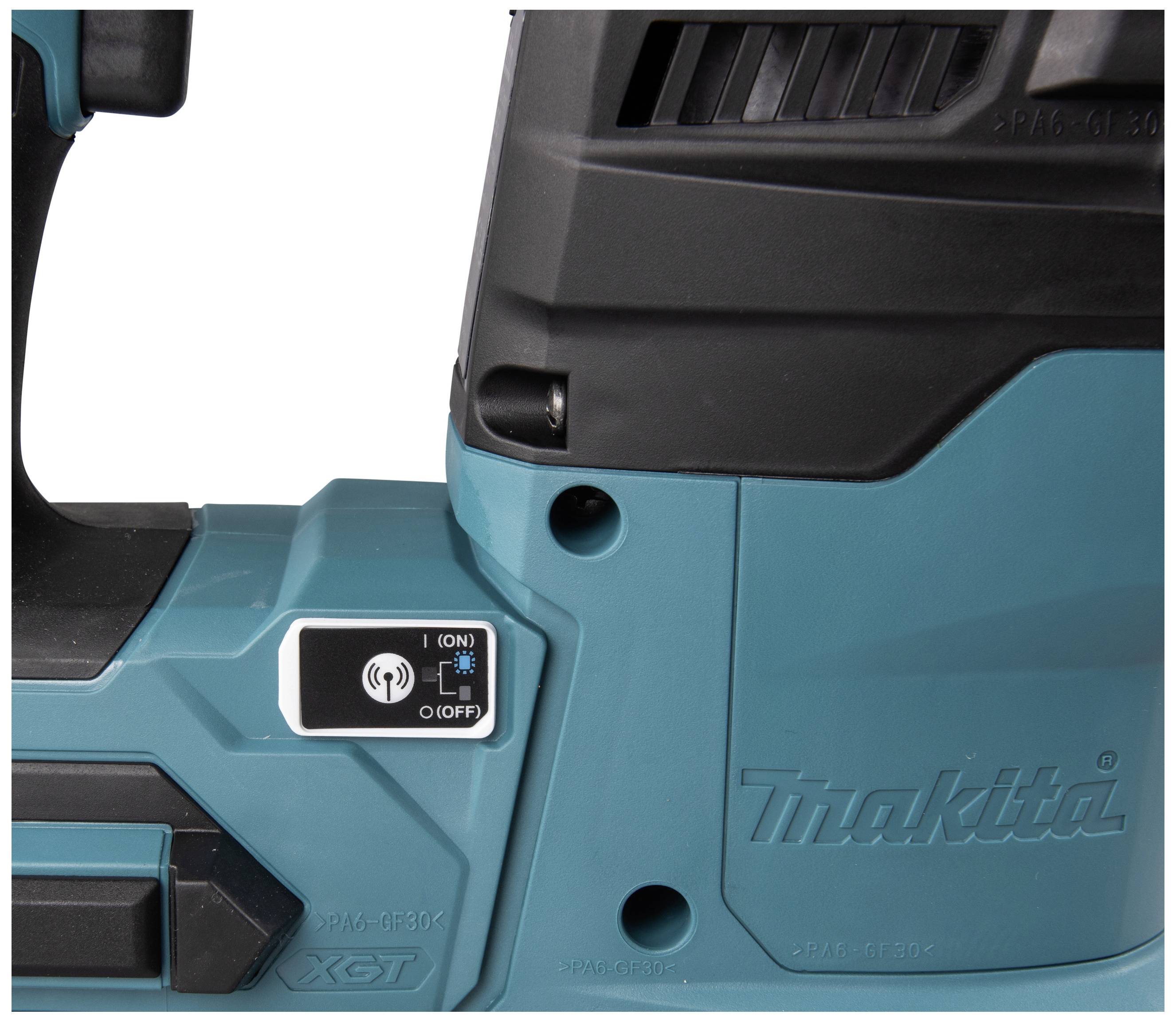 Elektrisches Werkzeug in der Nahaufnahme, blaues Gehäuse mit Ein- und Ausschalter, markiert mit 'Makita'.