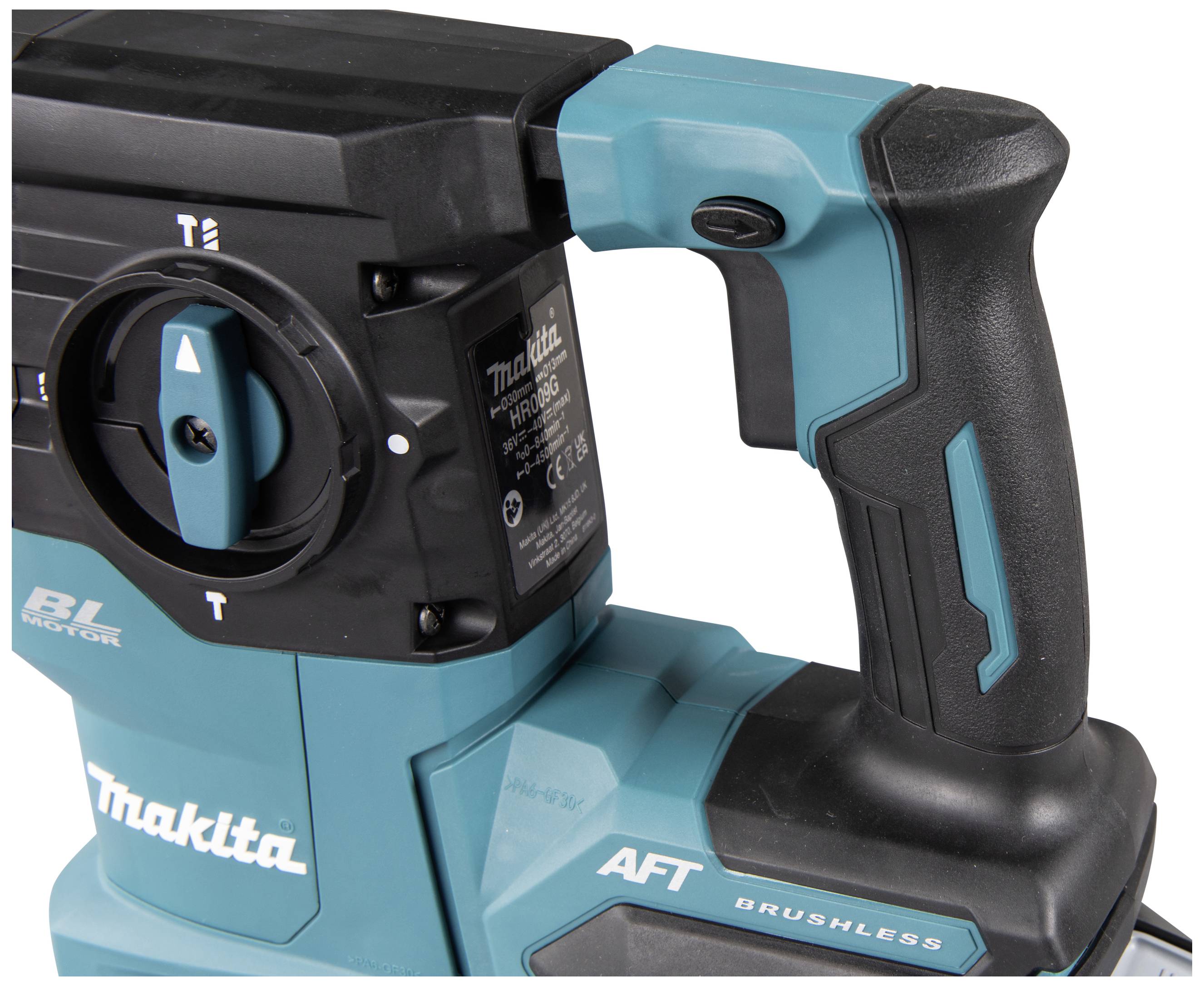 Ein elektrisches Werkzeug, möglicherweise ein Bohrhammer, mit einem schwarzen Griff und türkisfarbenem Gehäuse, Markenname sichtbar.