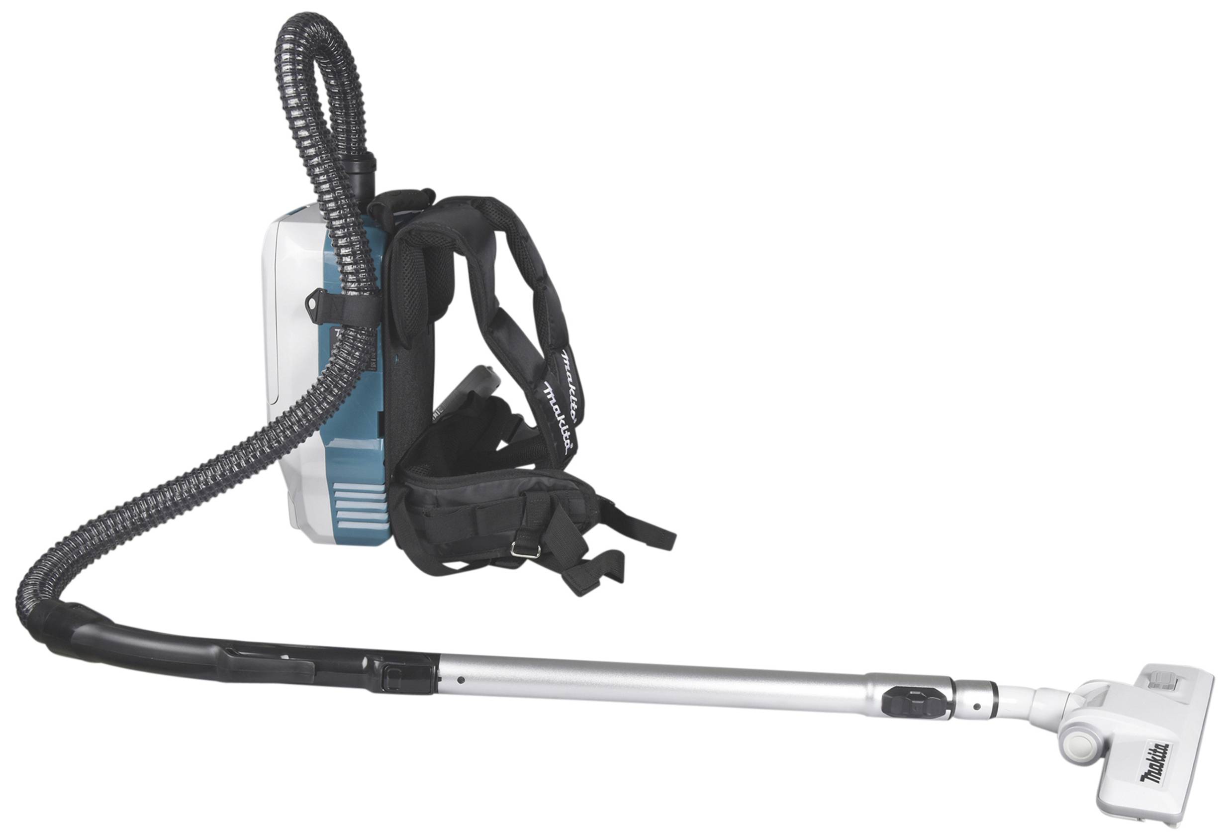 Rucksack-Staubsauger mit ergonomischem Gurt und Schlauch, steht aufrecht. Geeignet für effiziente Reinigung in gewerblichen Umgebungen.