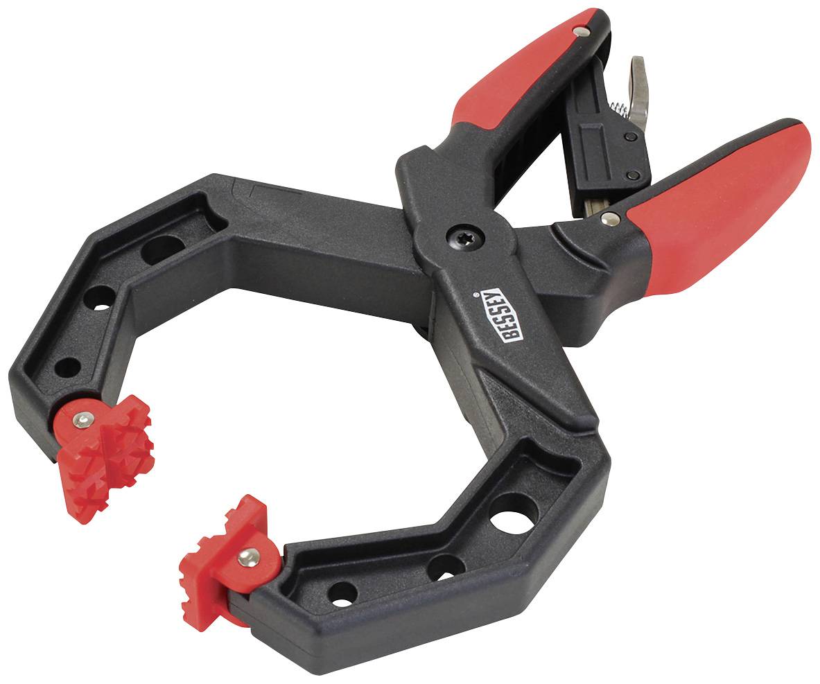 Eine schwarze und rote Zwinge mit Greifmechanismus, markiert mit 'BESSEY', verwendet zum Halten von Materialien in Werkstücken.