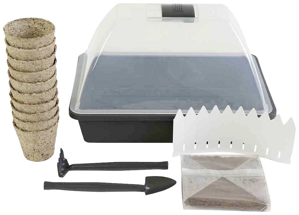 Ein Mini-Gewächshaus-Set mit mehreren Anzuchttöpfen, kleinen Werkzeugen, einem Pflanzschild und einer Saatgutpakung für das Anpflanzen.