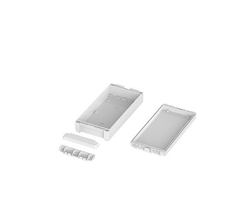 Ein rechteckiger, weißer Kunststoffbehälter, geöffnet. Der Deckel liegt daneben. Das Design ist schlicht und funktional.