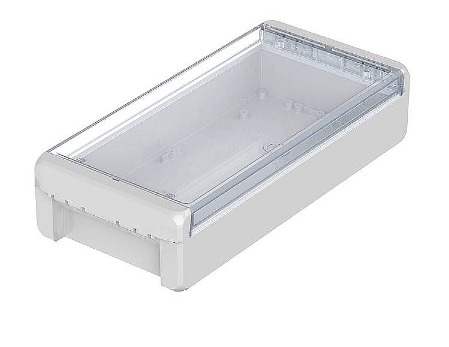 Ein rechteckiges, transparentes Kunststoffgehäuse mit abnehmbarer Abdeckung und abgerundeten Kanten.