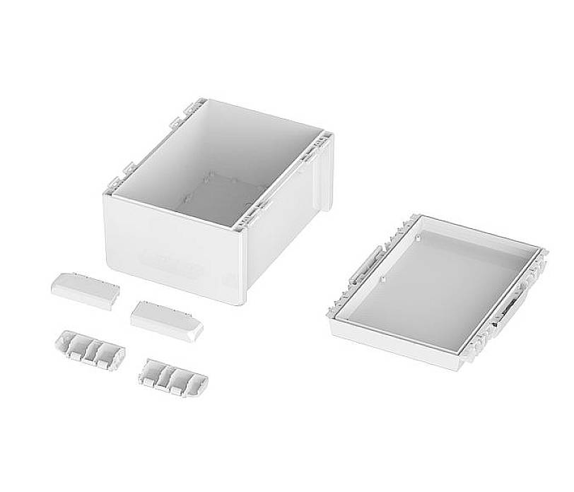 Weiße Kunststoffbox mit entferntem Deckel, vier kleinen getrennten Teilen; eignet sich zur Aufbewahrung oder Organisation von Gegenständen.