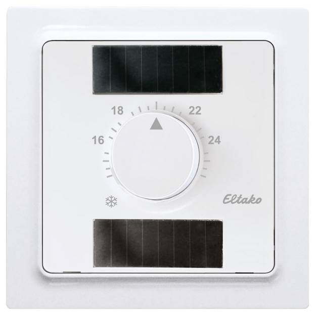 Ein weißes Thermostat von Eltako mit Drehregler für Temperatur zwischen 16 und 24 Grad Celsius. Zwei kleine Solarpaneele oben und unten.