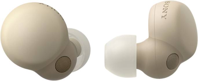 Kabellose, beige Ohrhörer mit rundem Design. Sicht auf Ohrstück und Lautsprecherseite.