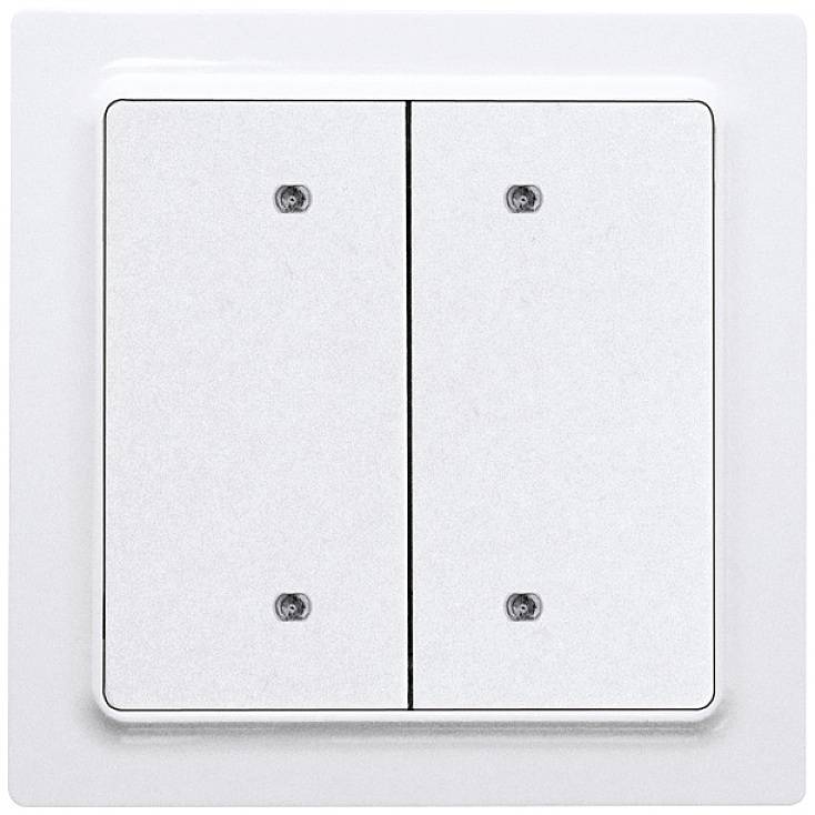 Ein Doppellichtschalter in Weiß an einer Wand, mit zwei Kippschaltern zur Steuerung separater Lichtquellen.