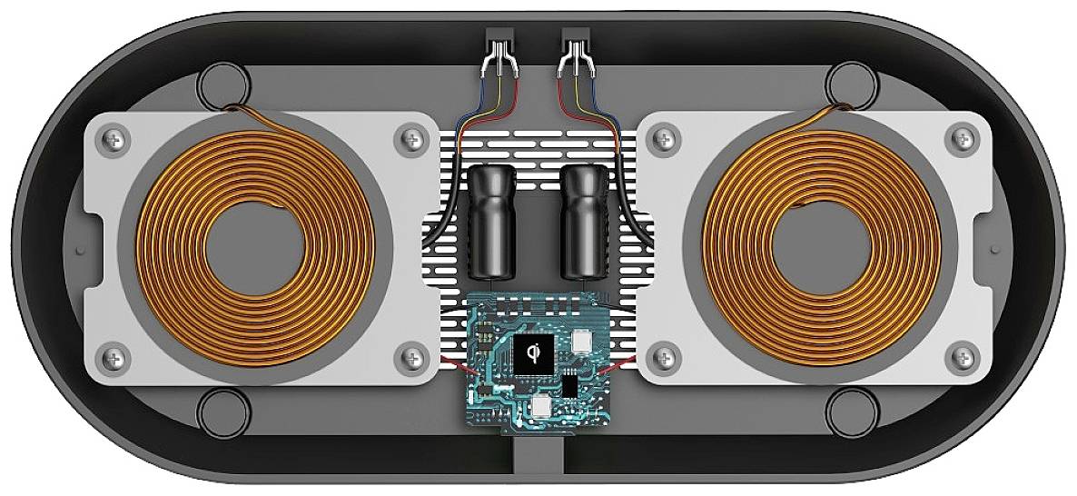 Obenansicht eines kabellosen Ladegeräts mit zwei Kupferspiralen und einer zentralen Steuereinheit. Hauptkomponenten sind sichtbar.