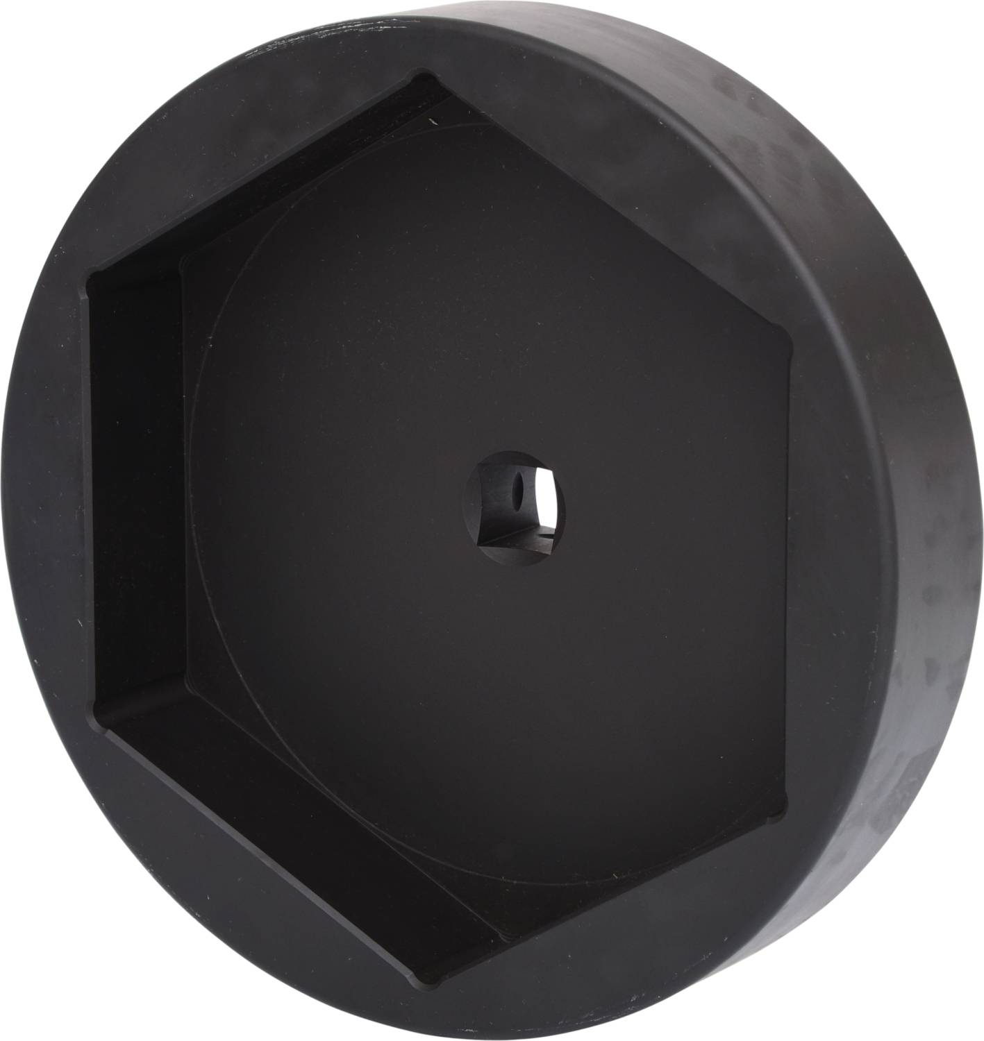 Schwarzes, hexagonales Kunststoffgehäuse mit zentralem Loch, möglicherweise für mechanische oder technische Anwendungen geeignet.