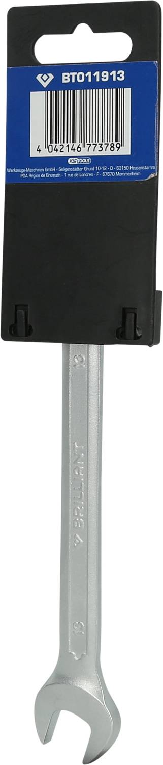 Ein silberner Schraubenschlüssel mit offener Maulöffnung, befestigt an einer schwarzen Halterung mit blauem Etikett und Barcode.