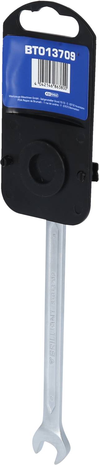 'GROHE Universal-Schlüssel BT013709' auf der Verpackung eines Werkzeugs. Ein silberner Schraubenschlüssel mit Kunststoffhalter.