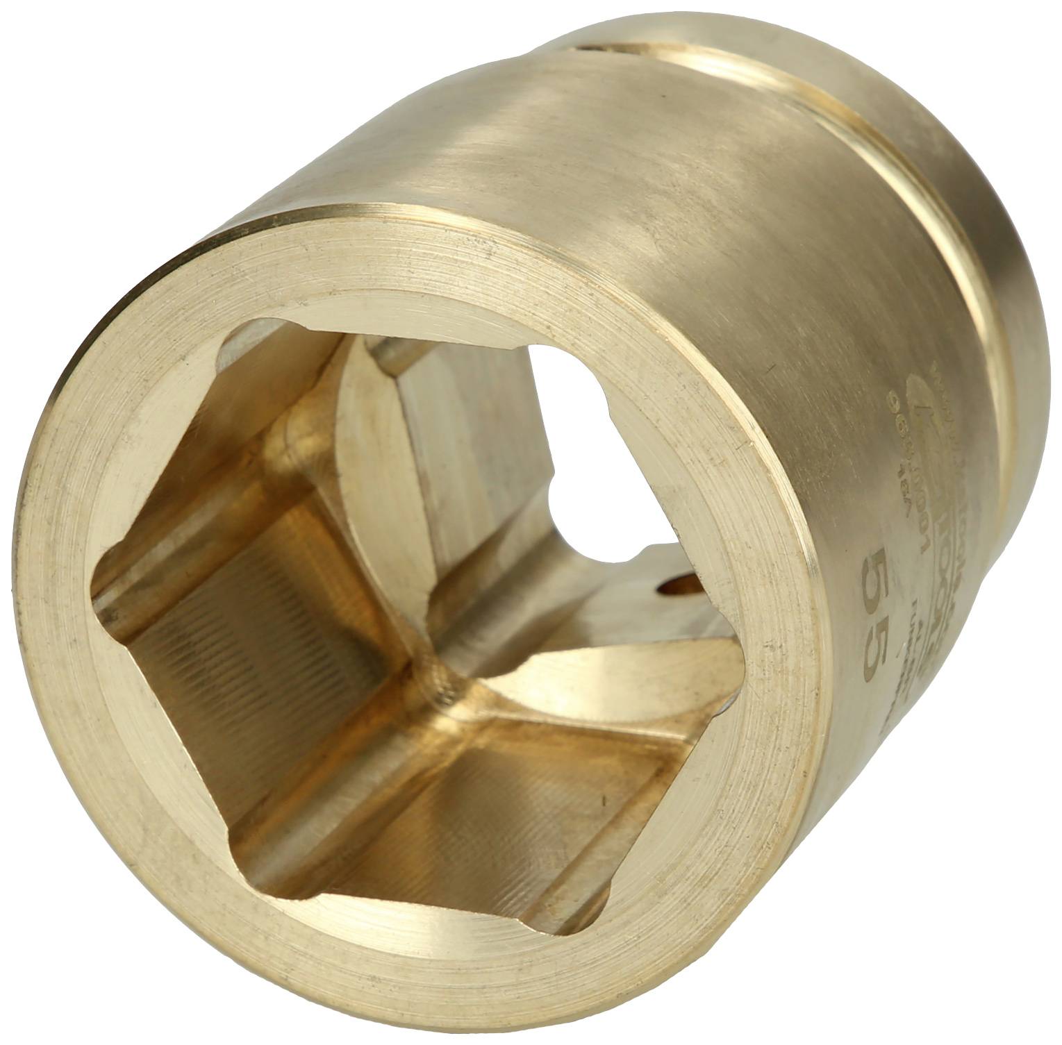 Ein sechseckiges, metallisches Werkstück aus Messing mit glatter Oberfläche und abgeschrägten Kanten, wird aus der Nähe gezeigt.