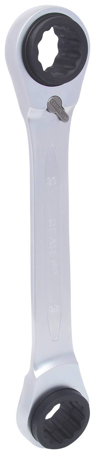 Ein silberner Doppel-Ringschlüssel mit schwarz geriffelten Innenringen. Ober- und Unterseite sind jeweils mit einem Ratschenmechanismus ausgestattet.