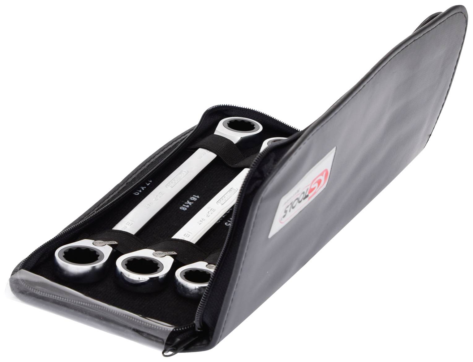 Ein offenes Etui mit vier Ringschlüsseln in verschiedenen Größen, die in Halterungen gesichert sind.