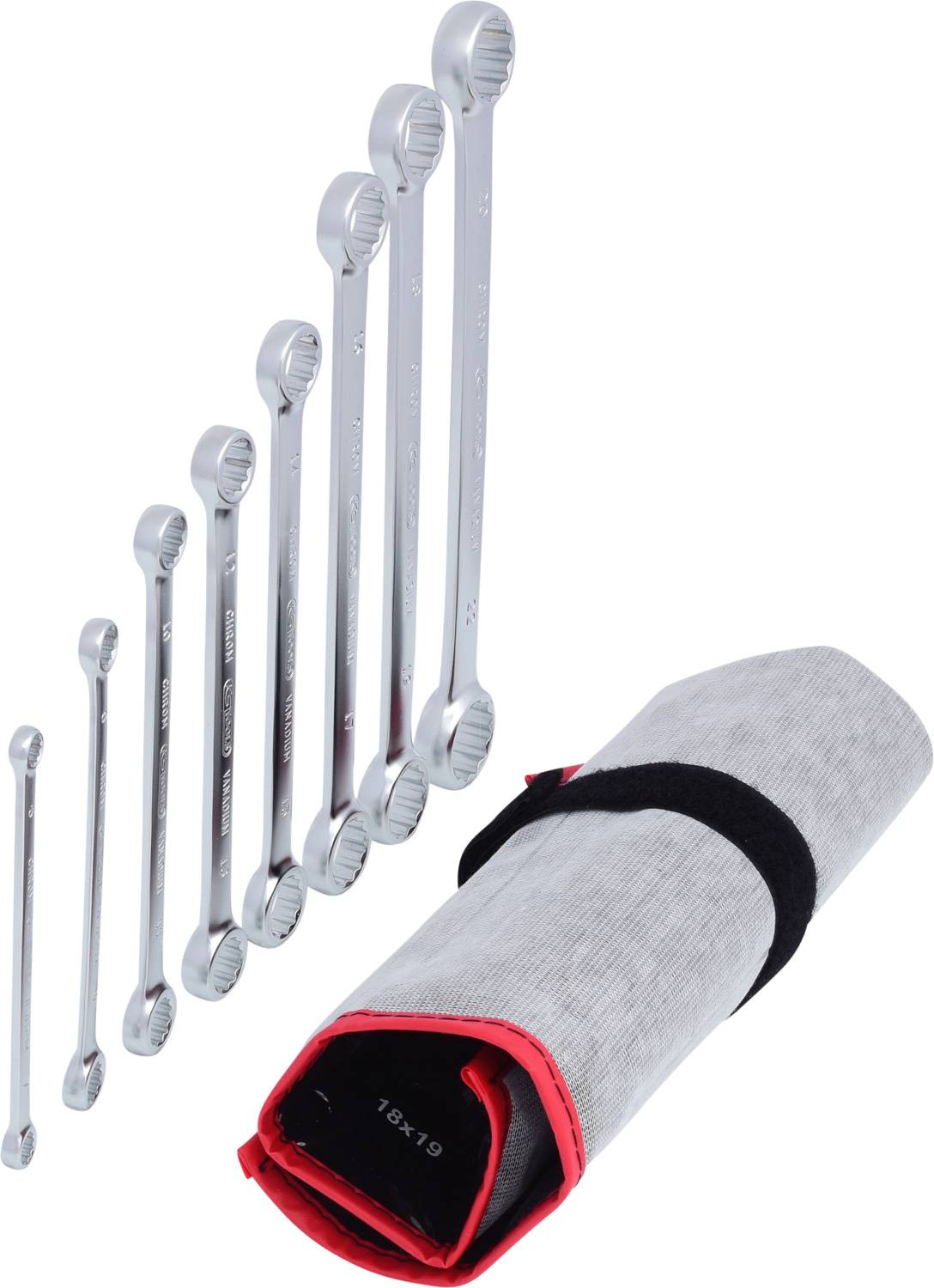 Satz Cromargan-Schlüsseln in verschiedenen Größen, aufgereiht neben einer zusammengerollten rot-schwarzen Werkzeugtasche.