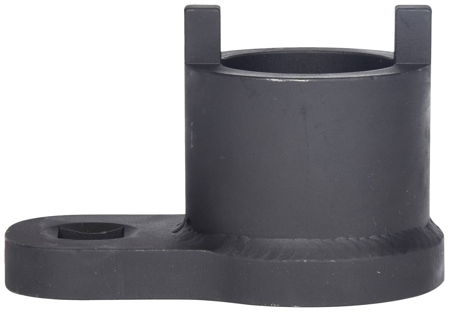 Ein schwarzes, zylinderförmiges Metallteil mit aufrechter Erhebung und einer seitlichen, flachen Verlängerung mit einer Sechskantöffnung.