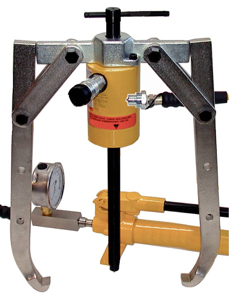 Hydraulischer Abzieher mit Manometer im Einsatz. Geeignet zum Entfernen festsitzender Teile. Hauptbestandteil ist eine zentrale Spindel.