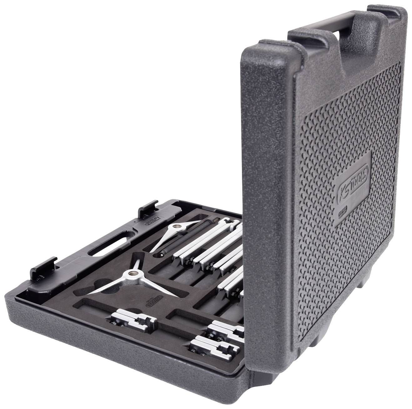 Ein offener, schwarzer Hartplastikkoffer enthält präzise Werkzeugteile wie Zirkel und Ersatzminenhalter, organisiert in vorgeformten Fächern.