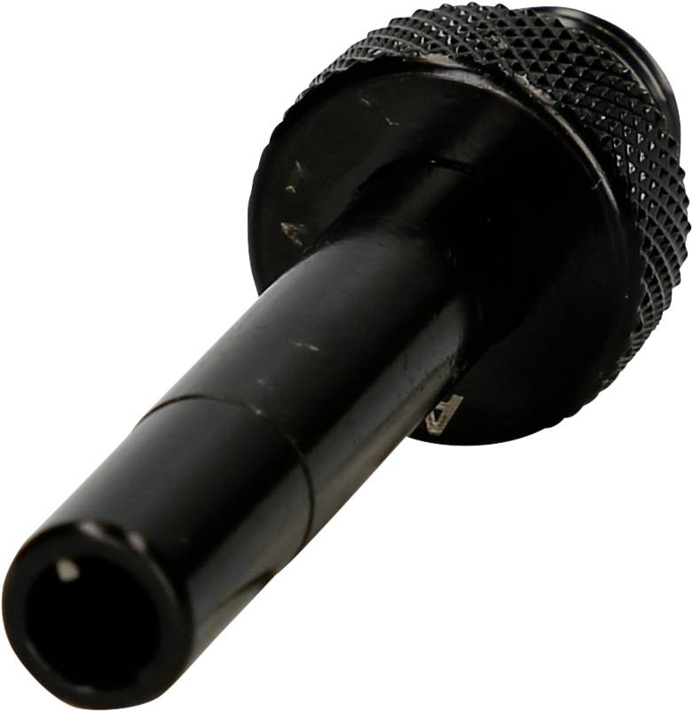 Ein schwarzer Steckverbinderadapter, zylindrisch mit gerändeltem Griff, seitlich auf einer weißen Oberfläche liegend.