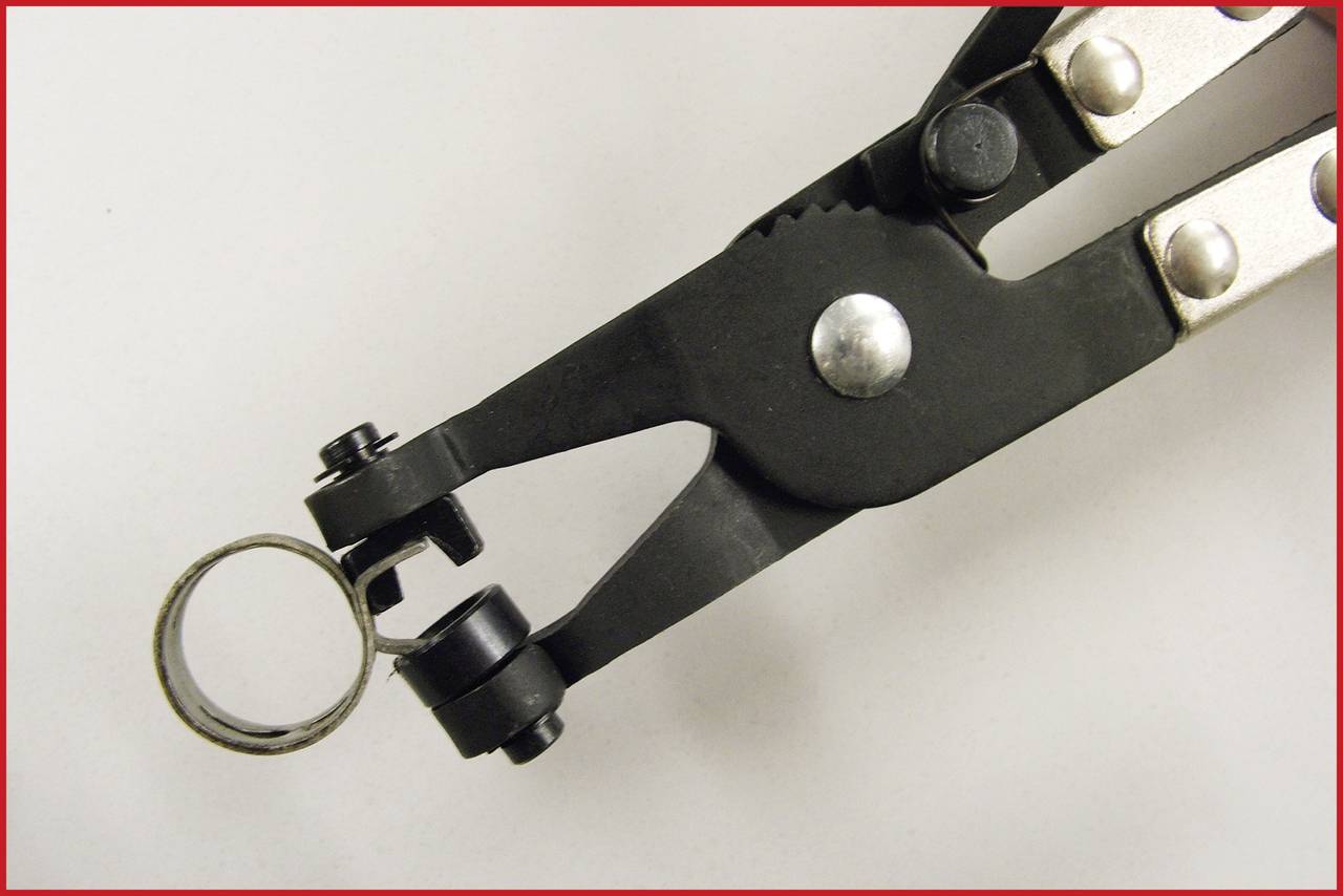 Zange zum Öffnen und Schließen von Sicherungsringen, mit schwarzem Griff und silbernen Metallteilen.